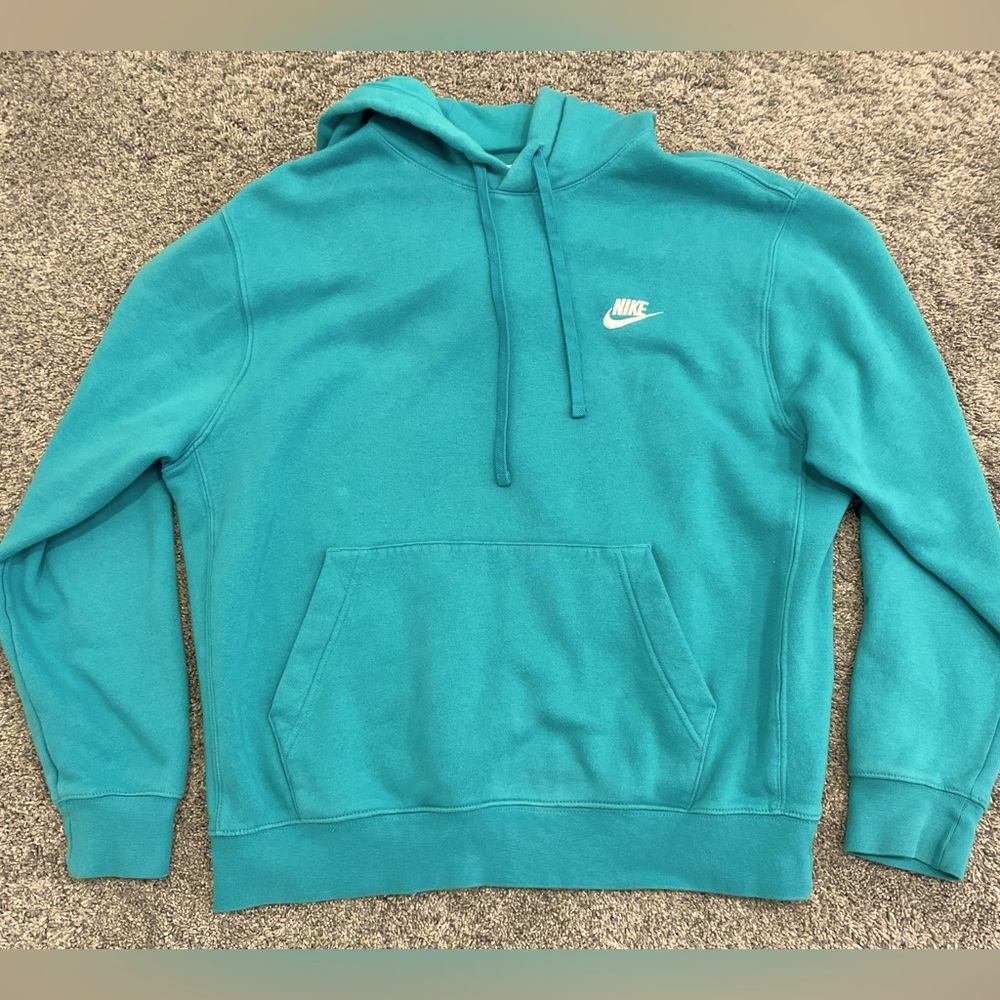 Nike hoodie. color teal. size medium in men’s.